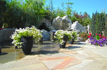 Hardscaping with tile and large flower pots
