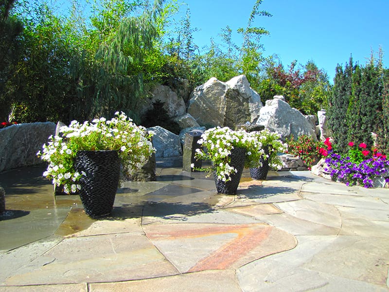 Hardscaping with tile and large flower pots