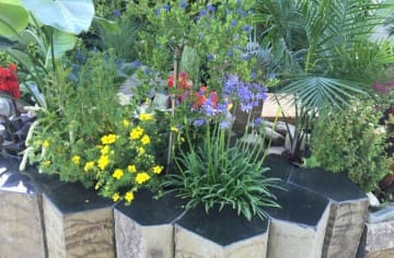 Polished Basalt as a Raised Garden Bed landscaping design